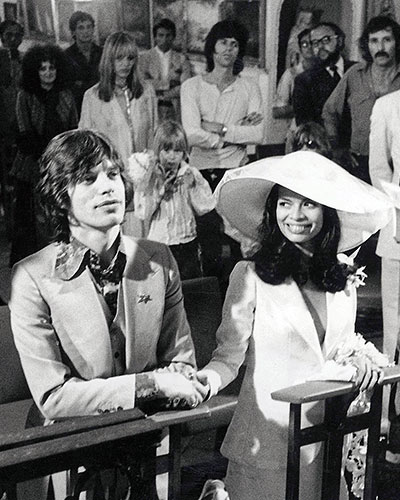 Bianca Jagger wearing white suit jacket on her wedding day